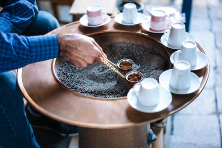 A man make Turkish coffee