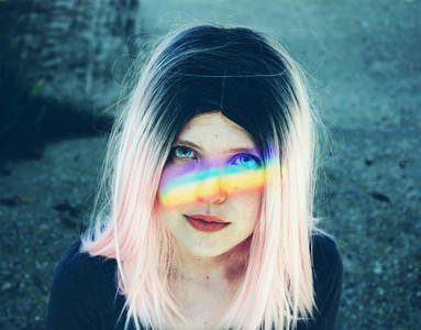 woman with a rainbow in her face