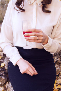 Woman holding a glass of wine