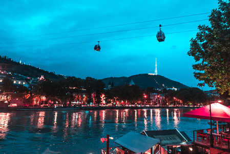 Evening view of Tbilisi and the Kura river at dusk