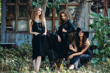 three vintage women as witches