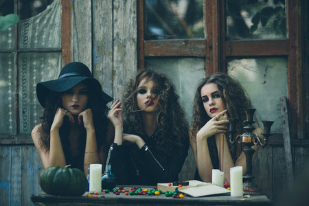 three witches at the table