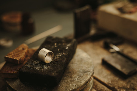 Ring on jeweler working table