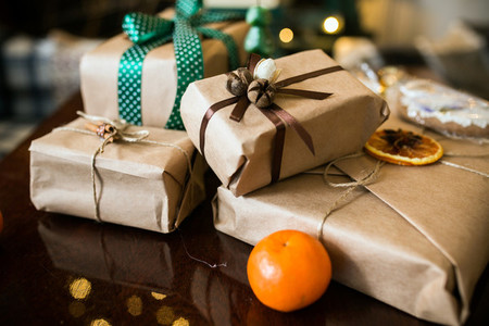 Beautiful themed gifts lie on wooden table