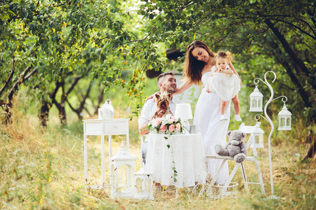 Young family with child at a picnic