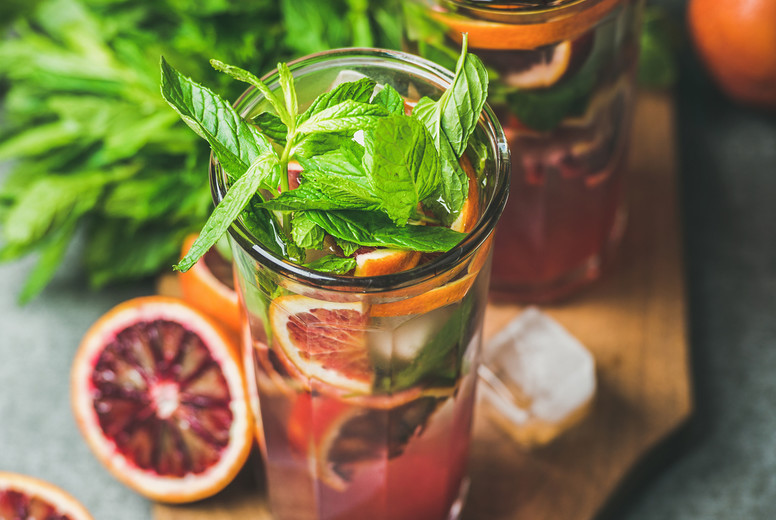 Blood orange lemonade with fresh mint and ice cubes