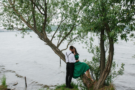 man and woman at the lake