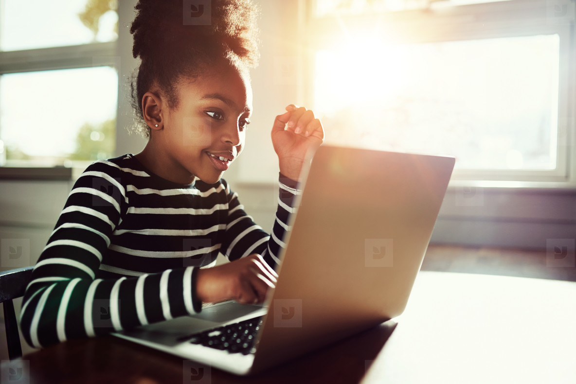 little girl working on her homework