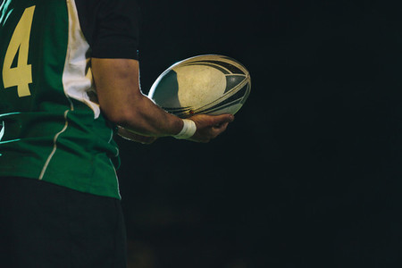 Rugby player with ball in hand