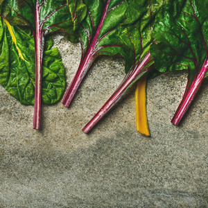 Flat lay of fresh leaves of swiss chard  square crop