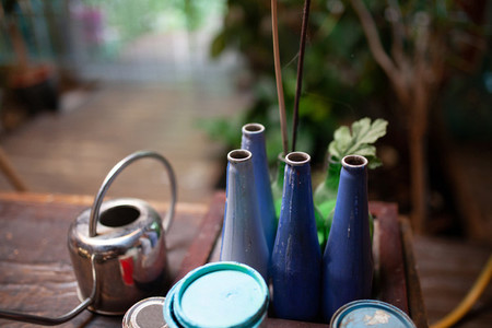 Closeup of bottles painted in blue