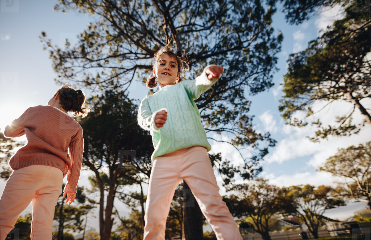 Small girls having fun at the playground