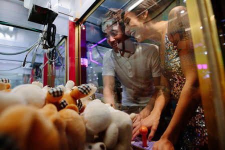 Couple at a gaming arcade