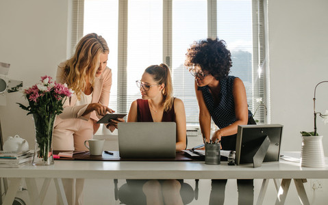 Group of businesswomen working together in office