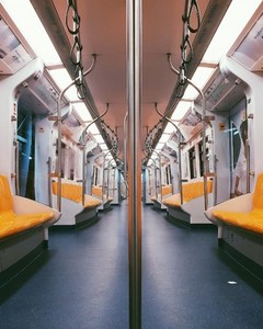 Yellow seats inside sky train