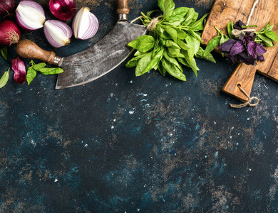 Healthy food cooking background over grunge dark blue plywood texture