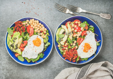 Clean eating concept breakfast with fried egg  chickpea  vegetables  seeds