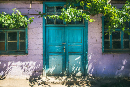 Purple wall and blue door of house Turkey
