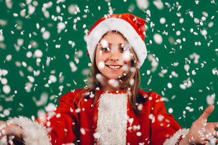 Portrait of a girl dressed as santa claus