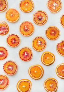Natural fruit pattern concept with blood orange slices