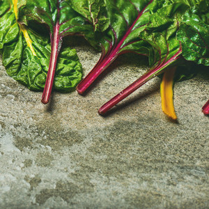 Flat lay of fresh leaves of swiss chard Healthy cooking concept