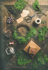 Flat lay of Christmas and New Year decoration over wooden table