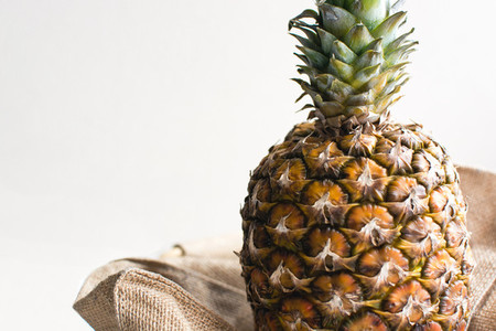 Fresh funky pineapple with a white background