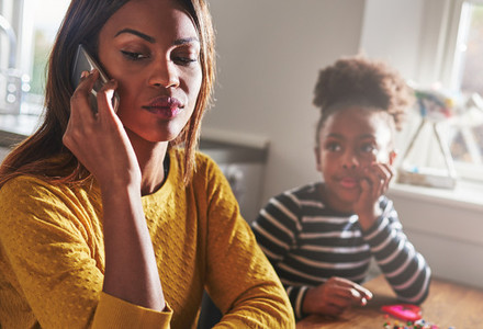 Mother talking on phone forgetting child