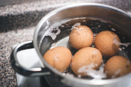 Hard boiled eggs in pot