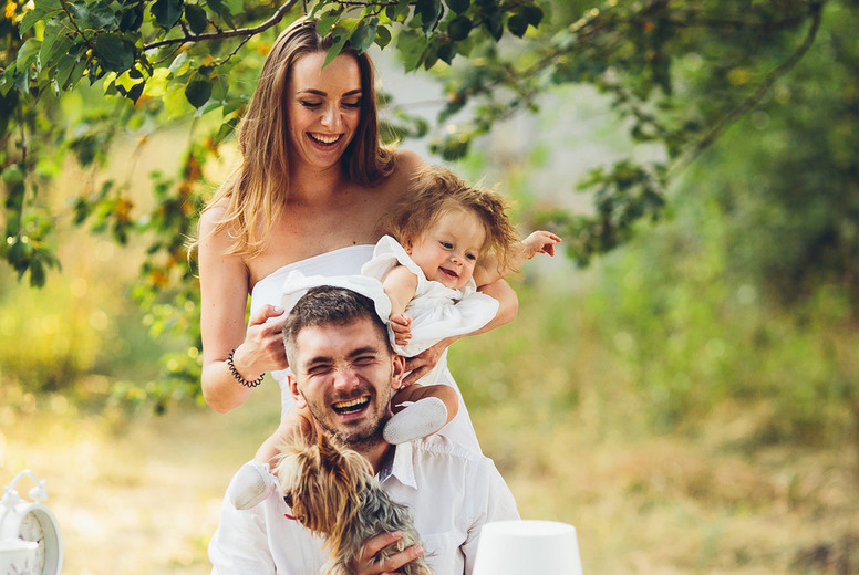 Young family with child at a picnic