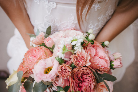 Bride with bouquet closeup