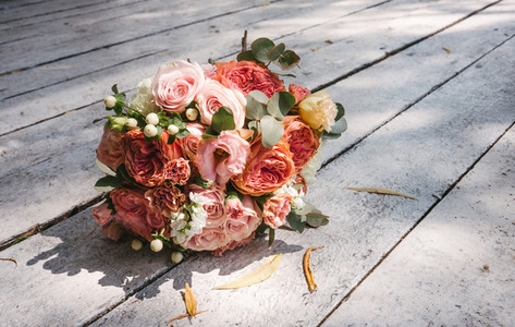 wedding bouquet on the wooden floor