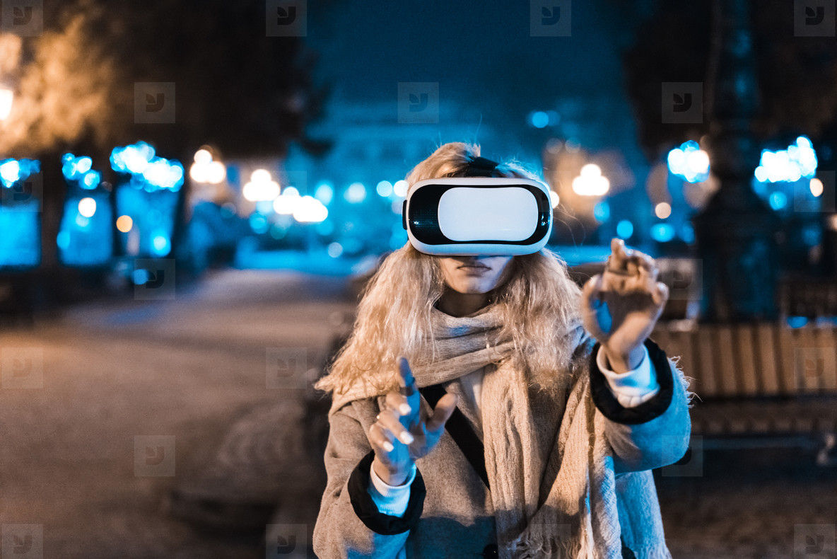 Young girl getting experience VR headset