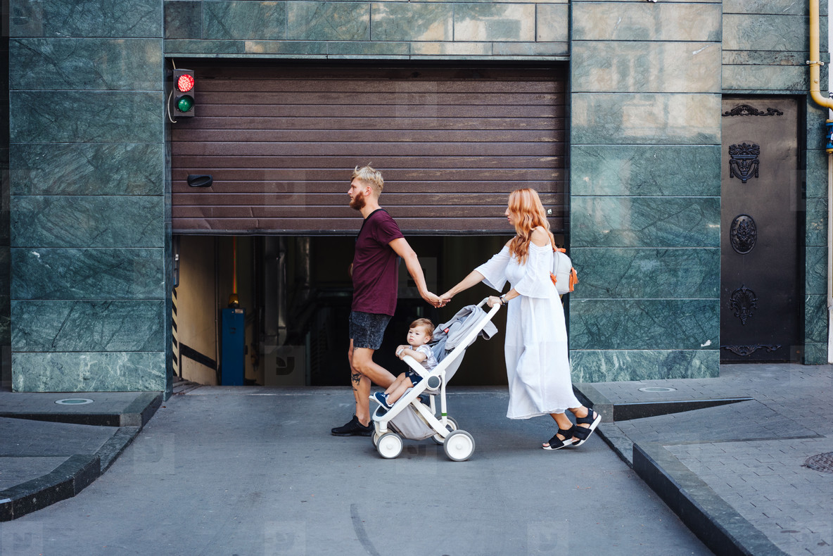 man and woman with a stroller