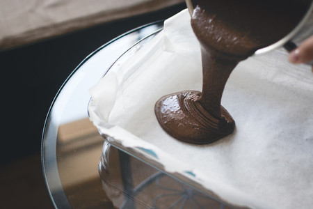 Pouring dough for a chocolate
