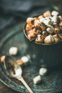 Close up of Winter warming sweet drink hot chocolate with marshmallows