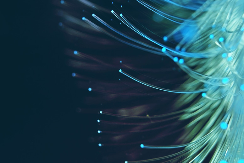 An amazing and vibrant macro of blue fiber optical pipes that il