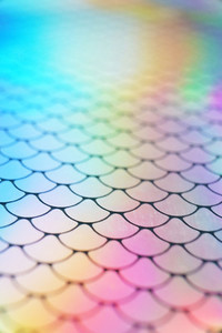 An amazing and vibrant macro of iridescent surface with scale te