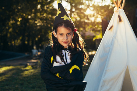 Cute little girl in wizard costume