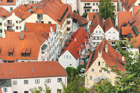views of the red roofs of the city of landshut from a nearby hill