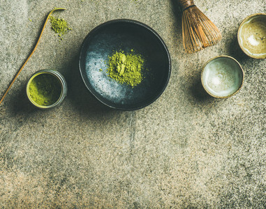 Japanese tools for brewing matcha green tea  grey concrete background