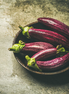 Fresh raw Fall harvest purple eggplants  selective focus