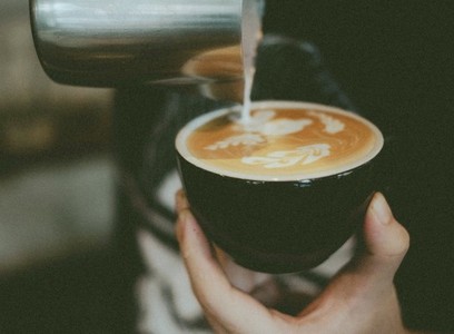 Barista making latte art