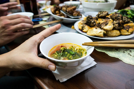 Eating Vietnamese fish soup