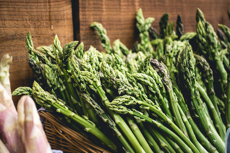 Shopping fresh green asparagus