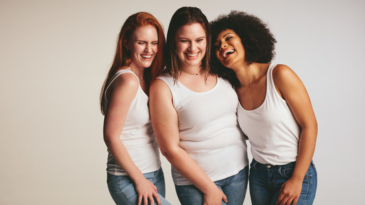 Diverse group of women laughing together