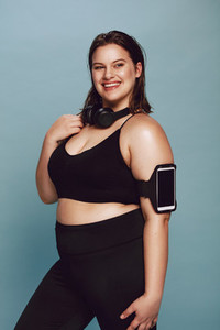 Plus size young lady in sportswear