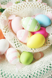 A beautiful and colorful close up flat of easter eggs in plain c