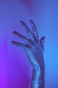 Blue glitter hand