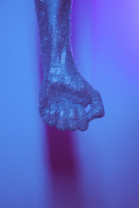 Blue glitter hand